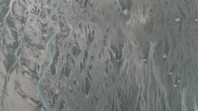 Aerial Pattern of Tidal Channels on Black Volcanic Sand