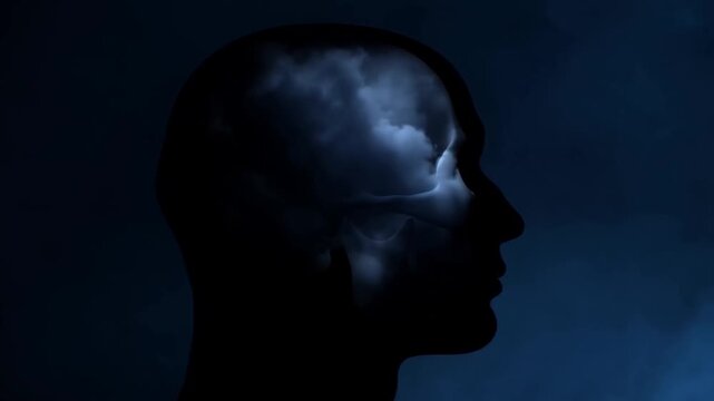 Human head silhouette with lightning illuminating the brain against a dark blue background