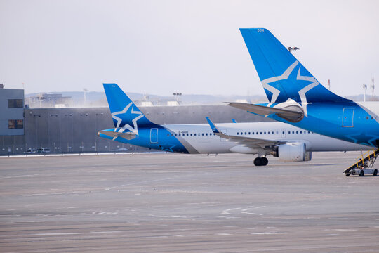 23 of Jnuary 2026 Air Transat aircraft parked on the apron at Montreal Trudeau Airport during winter operations. g.