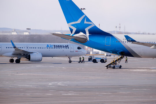 23 of Jnuary 2026 Air Transat aircraft parked on the apron at Montreal Trudeau Airport during winter operations. g.