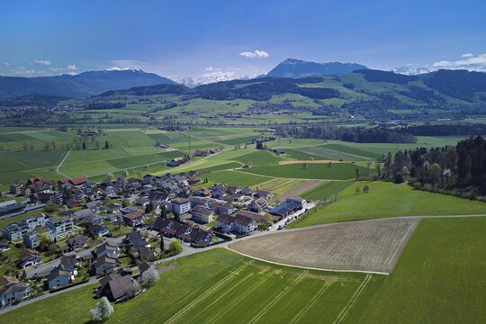 View of the village with the Alps with the Rigi in the background, Dietwil, Freiamt, Canton of Aargau, Switzerland