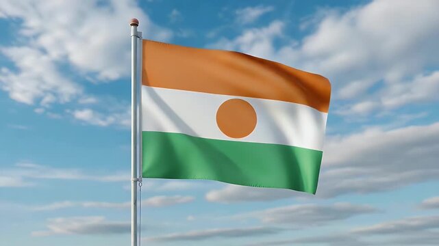 The national flag of Niger ripples in the breeze against a dynamic timelapse sky with fast-moving white clouds.