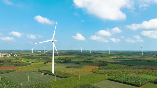 Wind farm under the blue sky and white clouds of the Baltic Sea in Xuwen County, Zhanjiang, Guangdong
