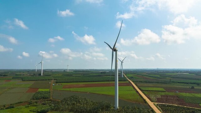 Wind farm under the blue sky and white clouds of the Baltic Sea in Xuwen County, Zhanjiang, Guangdong