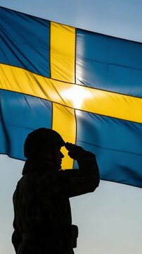 Silhouette of a Swedish soldier saluting in front of the national flag representing patriotism, military service, and national defense