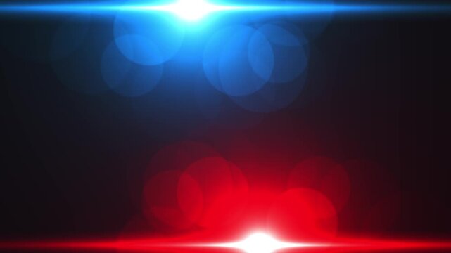 Red and blue light rays on black background