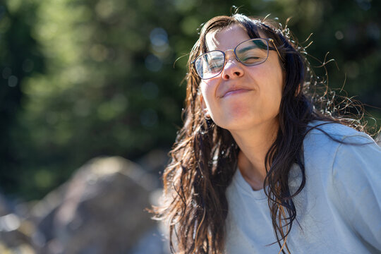 Girl making funny face in sunlight