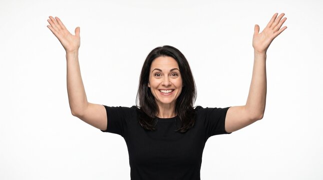 Excited happy woman standing with arms raised up celebrating victory on white background