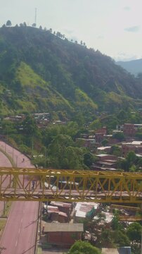 Metrocable riding over medellin colombia landscape