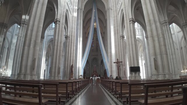 Central nave with the Argentine flag and main altar inside the Cathedral of La Plata City, Argentina D-Log M.