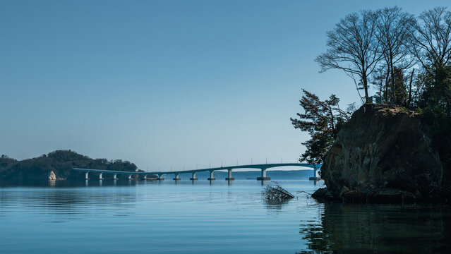 Calm bay and Notojima Ohashi Bridge at dawn seen from Wakura Onsen, Noto, Ishikawa, Japan
