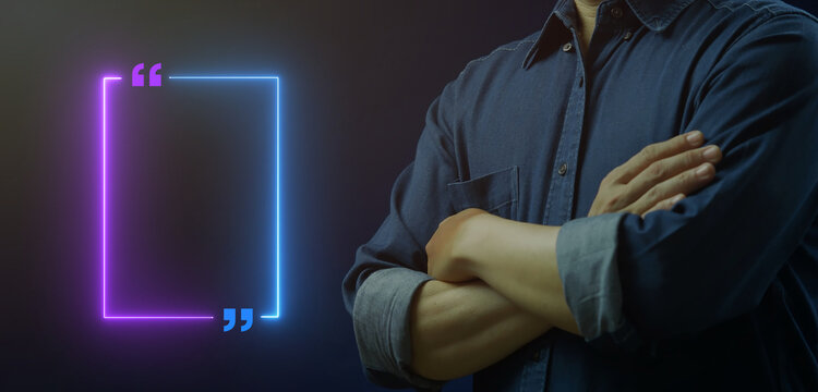 Businessman with arms crossed standing beside glowing empty rectangular neon quotation dialogue frame mockup. Customer feedback review template, client testimonial, and dialogue quote concept.