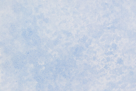 blue watercolor background painted on paper texture