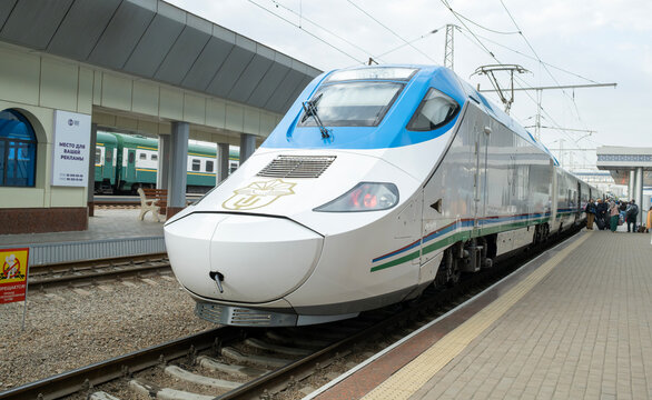Tashkent, Uzbekistan &ndash; September 30, 2024: The Afrosiyob Talgo 250 high-speed train arrives at a modern Tashkent railway station.
