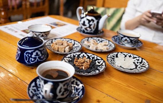 Bukhara, Uzbekistan &ndash; October 3, 2024: The interior of Silk Road Tea House features timber beams, brick arches, and authentic Uzbek atmosphere.
