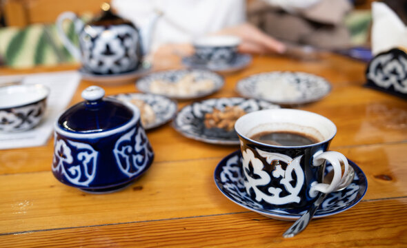 Bukhara, Uzbekistan &ndash; October 3, 2024: The interior of Silk Road Tea House features timber beams, brick arches, and authentic Uzbek atmosphere.