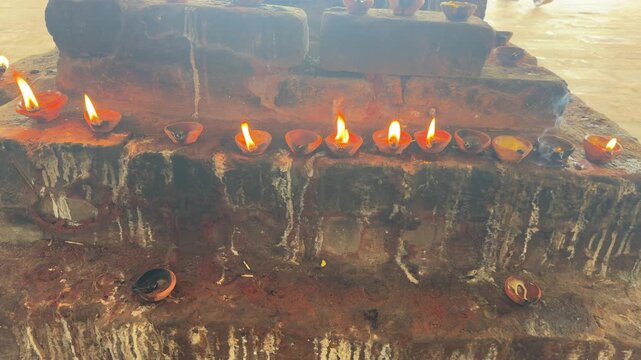 Traditional Oil Lamps Burning at a Sikharchandi Hill Temple in India