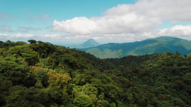 Aerial view of Monteverde cloud forest with distant Arenal volcano in Costa Rica