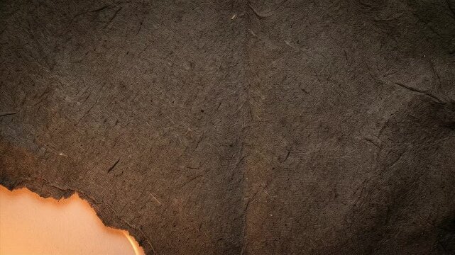 Subtle firelight glowing behind torn paper texture in a dark atmospheric Halloween 