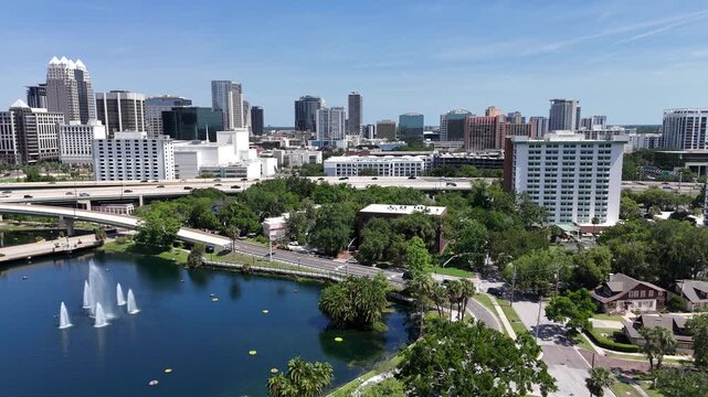 View looking over the Lake Lucerne and the 408 expressway with the downtown Orlando skyline in Orange County, Orlando, Florida, USA.