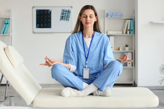 Burnout and healthcare stress, nurse practicing meditation and mindfulness in clinic to manage mental health and work pressure during hospital shift