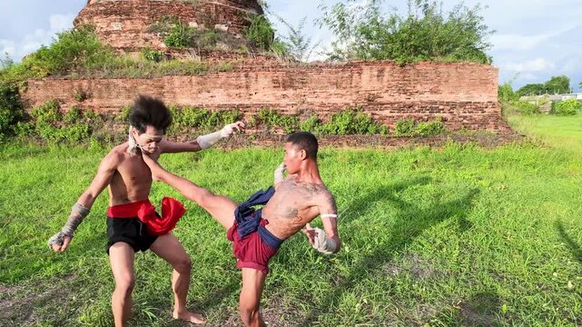 Traditional Muay Thai Fighters Sparring at Ayutthaya Historical Park
