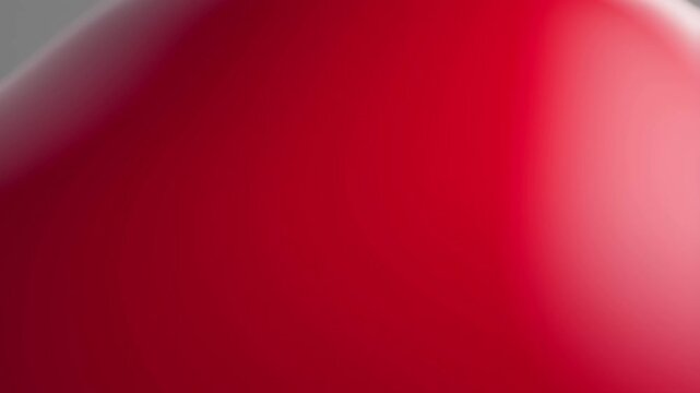 Abstract red gradient motion background with soft fluid light transitions