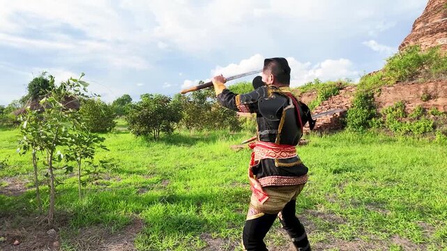 Thai Warrior in Ancient Armor Training at Ayutthaya Historical Park