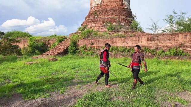 Thai Warriors Sparring with Swords at Ayutthaya Ancient Ruins