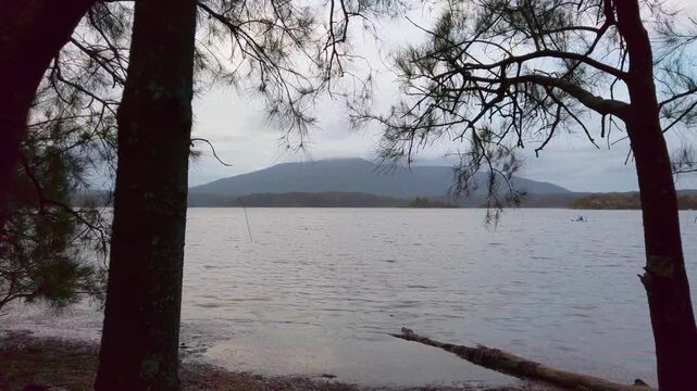 Kayaking on the water by the mountains