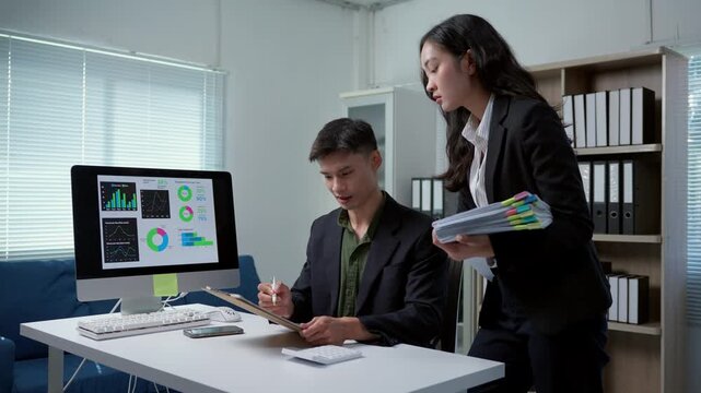 Frustrated employees arguing over financial data analysis in the office
