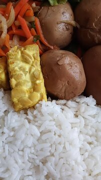 Traditional Indonesian simple meal rice with frien tempej ?aulehentic?asian culsine