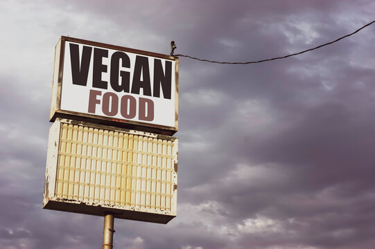 Aged vintage vegan food sign