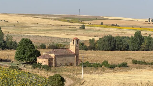 Old hermitage standing in a vast spanish rural landscape