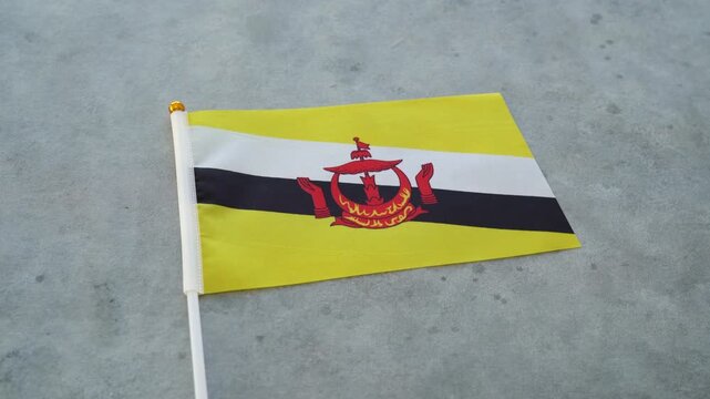 Brunei country flag close-up. Brunei flag concept.