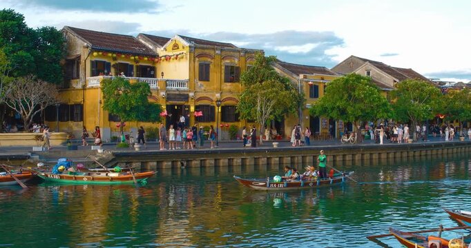 Time lapse of timelapse of Hoian Old town in Hoi An city, Da Nang province, Vietnam. Panoramic riverside of Ancient town, UNESCO world heritage. One of the most travel popular touristic destinations 