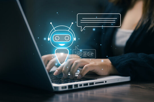 Businesswoman using laptop with virtual chatbot and message interface, illustrating AI customer service, online communication, automated support, digital assistant and business technology.