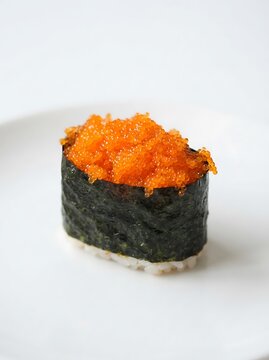Tobiko gunkan sushi isolated on white background