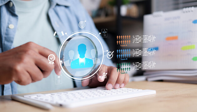 Digital HR management analyzing employee profiles and team performance using data interface