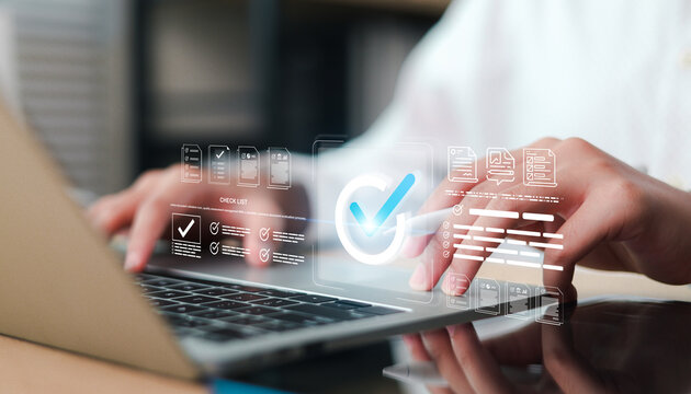 Reviewing digital checklist for document validation and quality assessment on tablet. Concept of approval process, quality control, and workflow management.