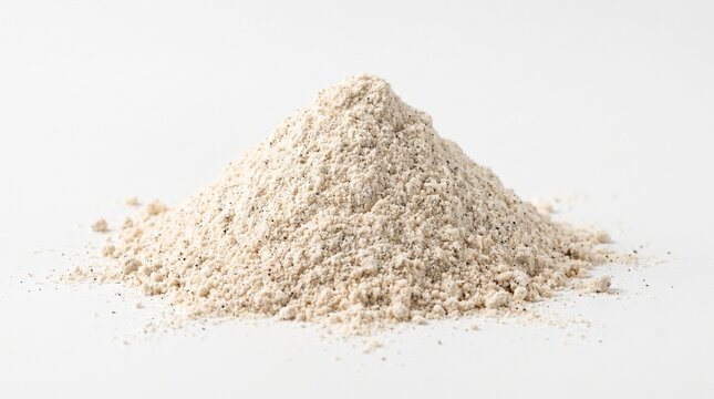 Pile of whole wheat flour or fine beige powder isolated on white background