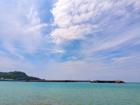 Summer blue sky, crystal clear sea, and resort scenery