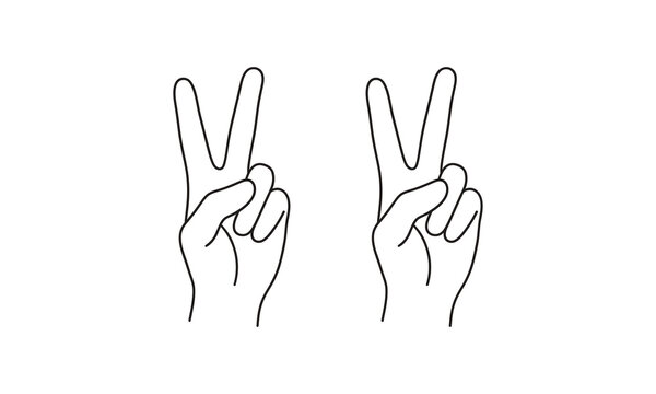 Two hands showing peace sign gesture
