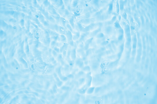 Abstract transparent water shadow surface texture natural ripple on blue background