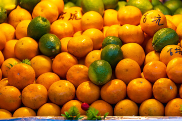 Obraz premium Citrus Fruit Display at Dihua Street Market