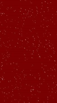 Animation of winter scenery with snow falling on red background