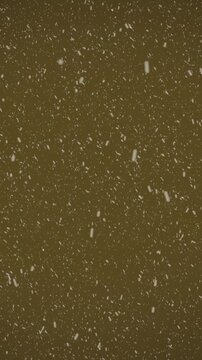 Animation of winter scenery with snow falling against brown background