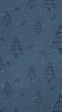 Animation of snow falling against christmas tree pattern on blue