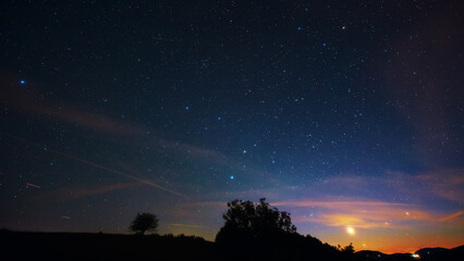 Crescent Moon, planet conjunction and landscape scenery silhouettes. © astrosystem
