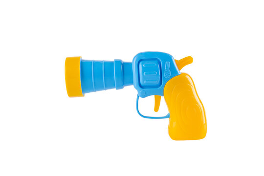Blue plastic toy gun in hand on transparent background